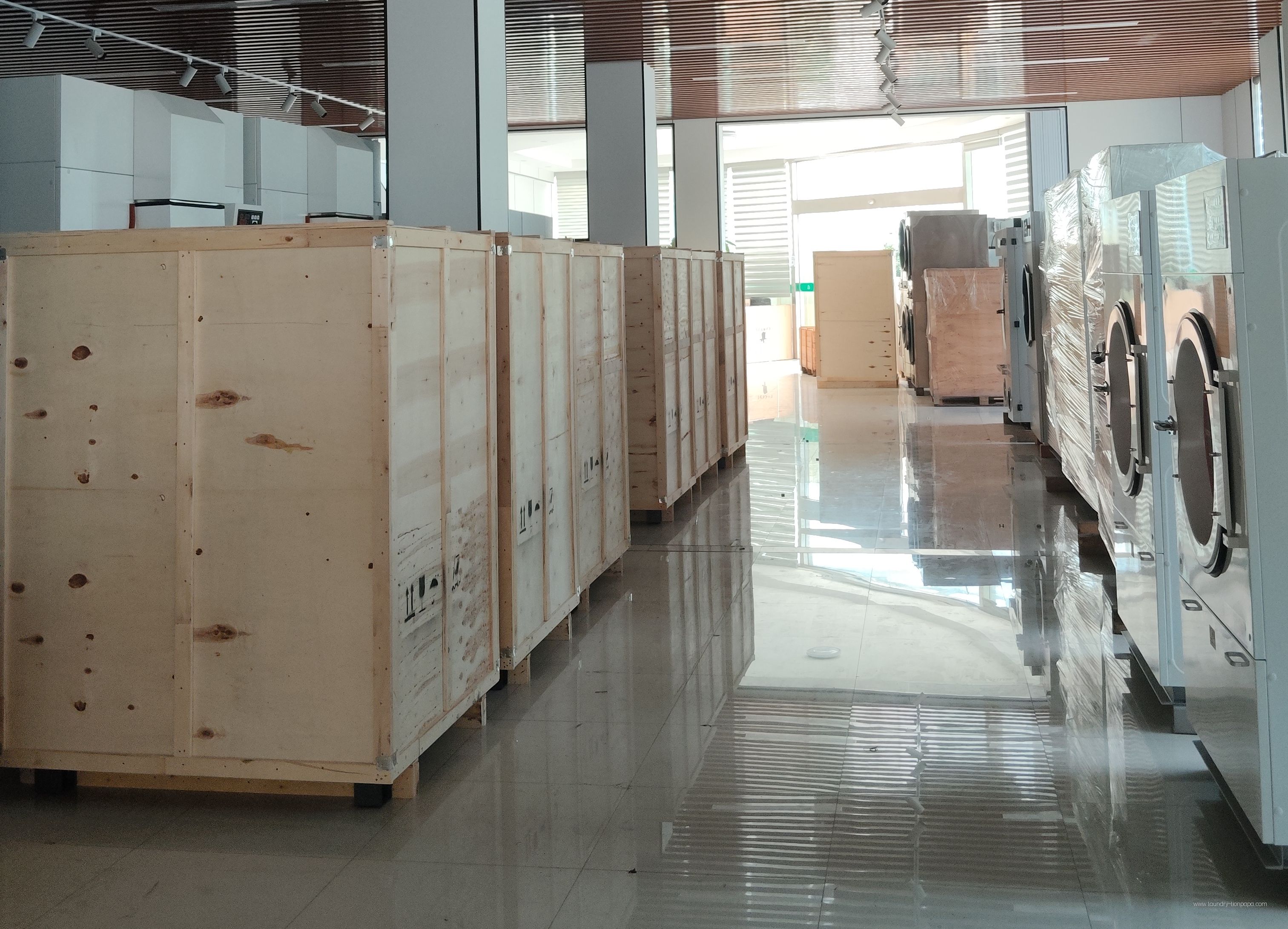 Laundry equipment and shipping crates in the dispatch area