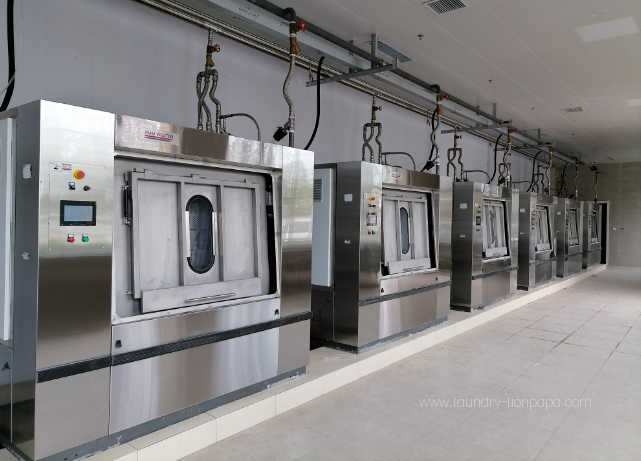 Industrial laundry machines arranged in the production area