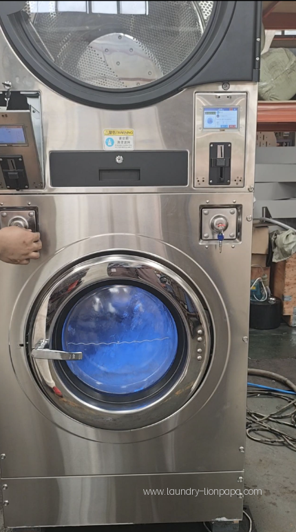 Stacked washer-dryer during a control demonstration