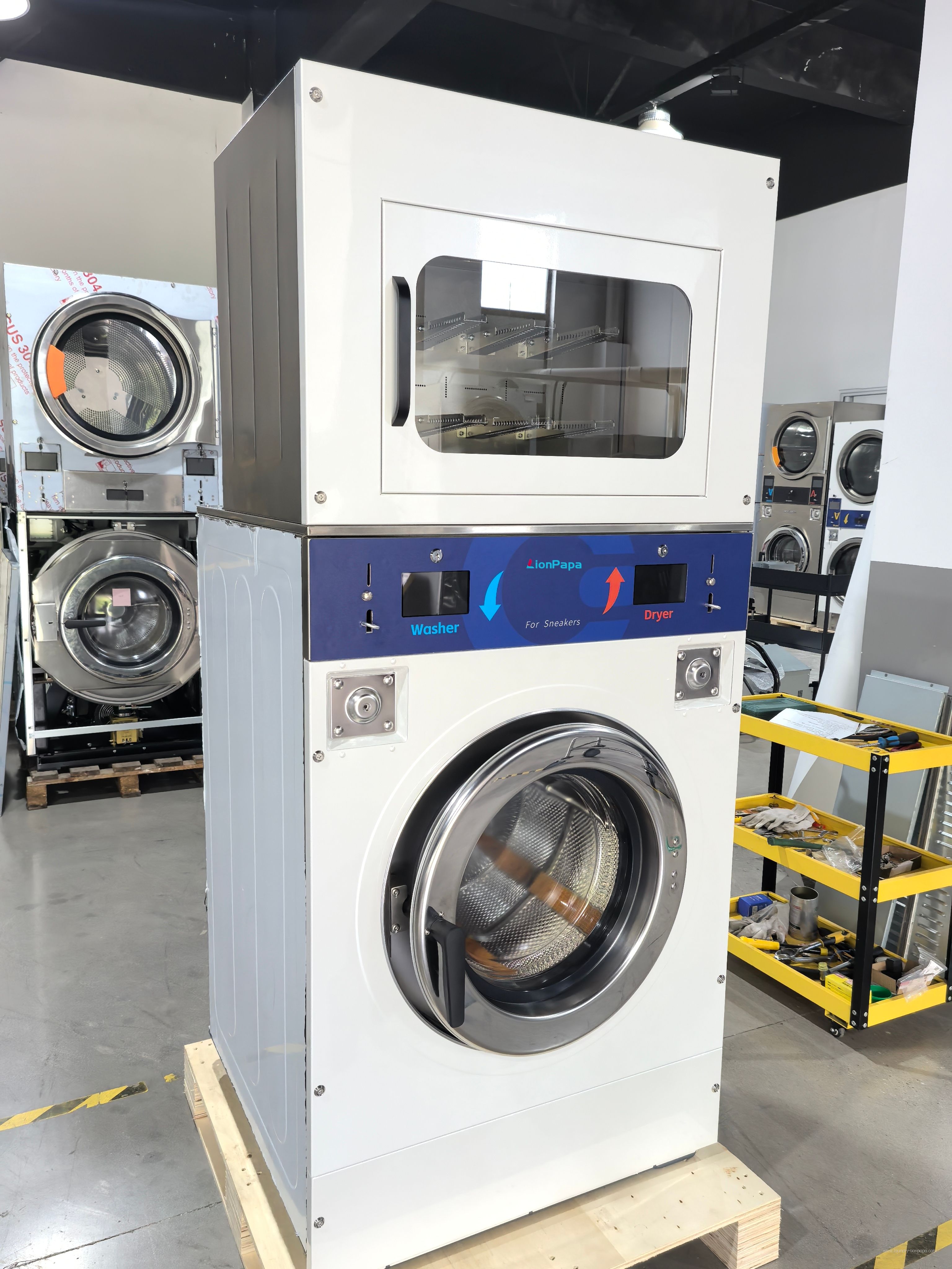 Stacked sneaker washer-dryer with the drying compartment closed